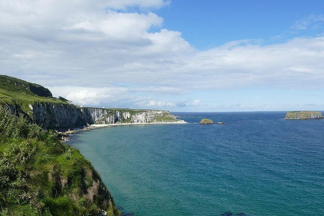2-Day Northern Ireland Rail Tour: Belfast, Antrim Coast, and Giant's Causeway - Carrick-a-Rede Rope Bridge: worth the charge, plan for the wind