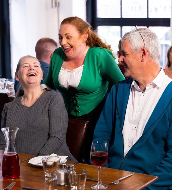 Cork: Hysterical Histories, Comedic Dinner Theater Show - How the Dinner Theater Works: Comedy, Music, and Audience Participation