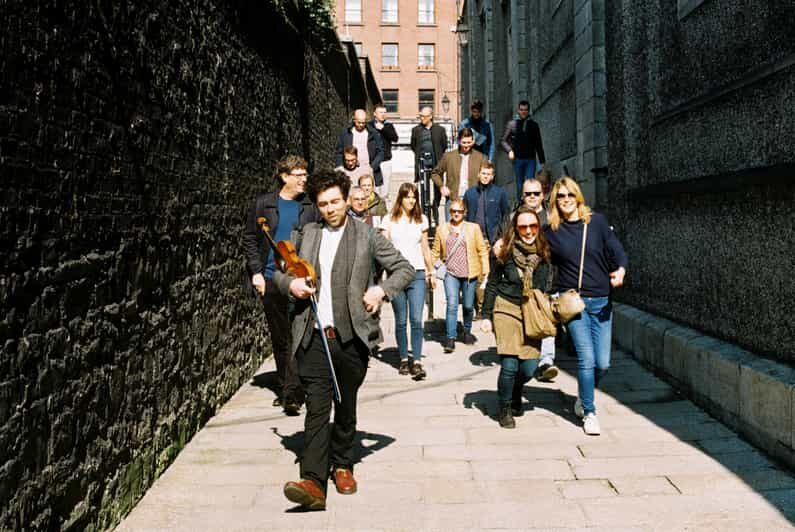 Dublin: Irish Music Walking Tour with Live Performance - Stop-by-stop songs: laments, murder ballads, and freedom themes