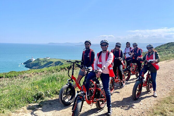 Dublin Panoramic e-Bike Tour with Howth Adventures - Howth Harbour piers and the lighthouse run-up