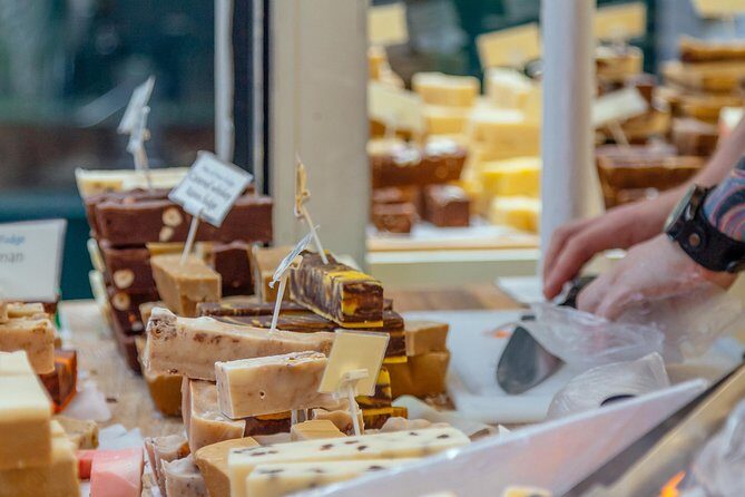 Dublin Private Walking Food Tour With Locals with 10 Tastings - Trinity College Dublin pass-by: Georgian buildings meet modern city life
