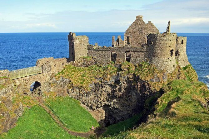 Dublin to Belfast Black Cab, Dunluce Castle and Giant's Causeway - The Peace Wall Stop: Why It Exists and How It Changed