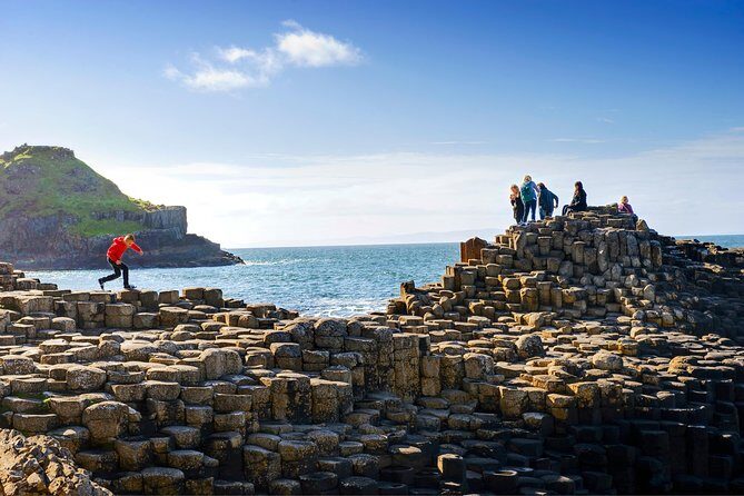 Dublin to Dunluce Castle, Giant's Causeway, Dark Hedges & Belfast - Dunluce Castle: cliff drama, clan stories, and Pyke connections