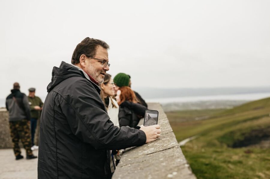 From Galway: Cliffs of Moher and The Burren Guided Day Trip - From Kinlay Hostel Galway to Kinvara: the day starts with coastline views