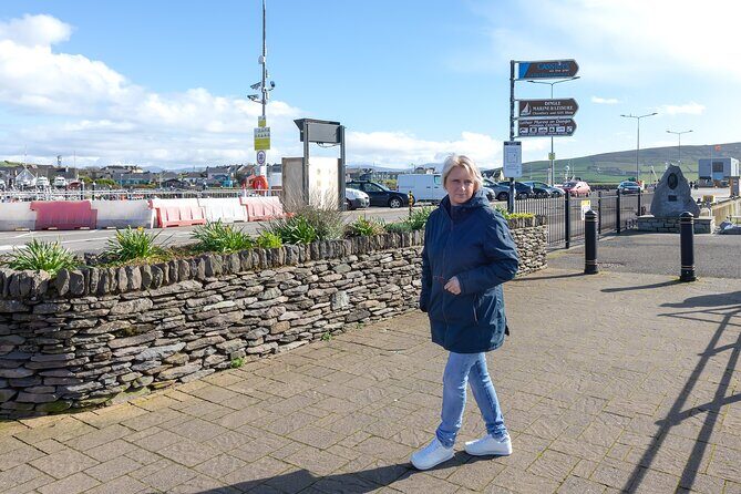Personalized Full-Day Dingle Peninsula and Slea Head Drive Tour - Fahan BeeHive Huts: walking up to ancient stone cones